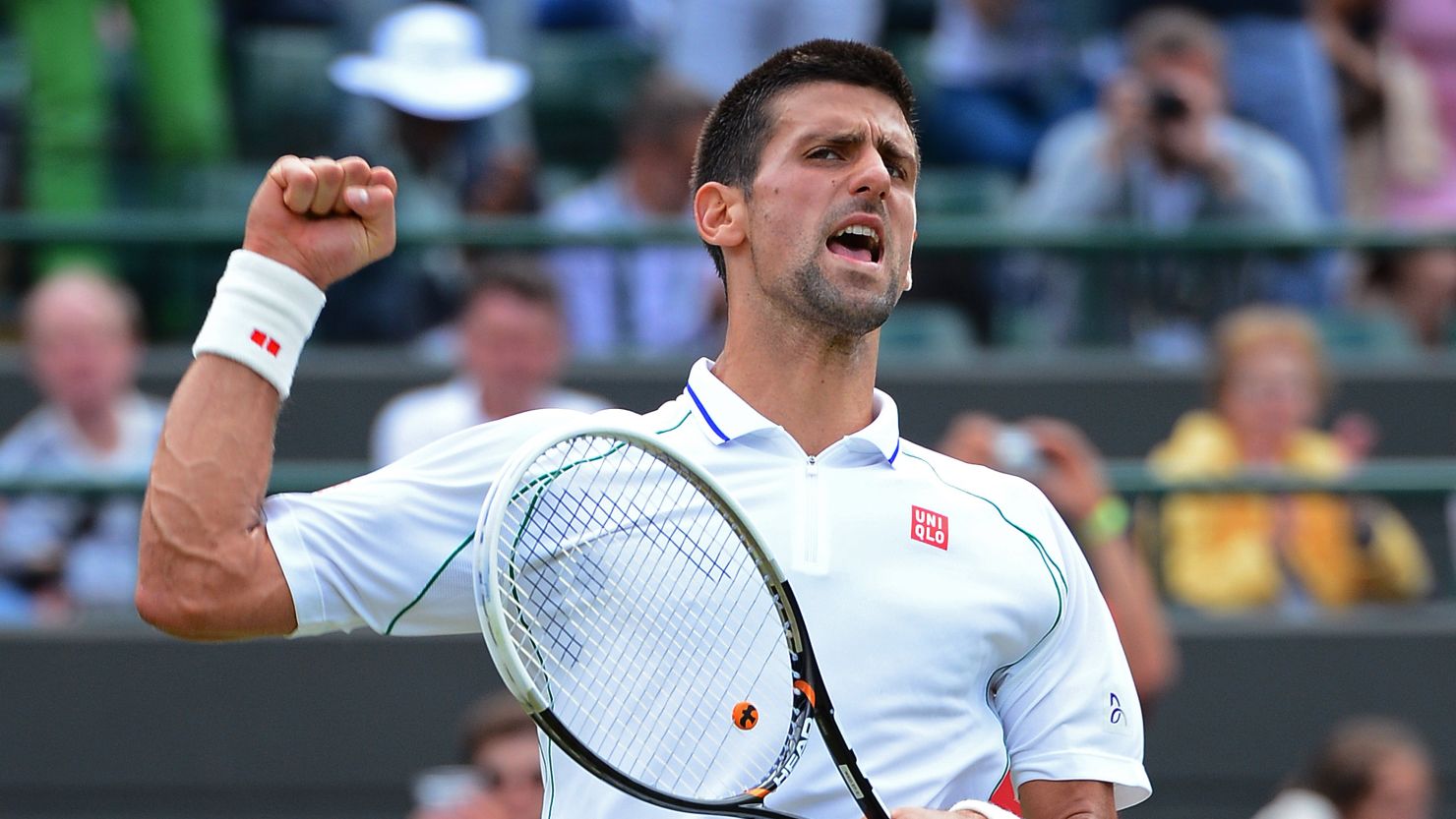 Novak Djokovic celebrates his quarterfinal victory over Florian Mayer at Wimbledon.