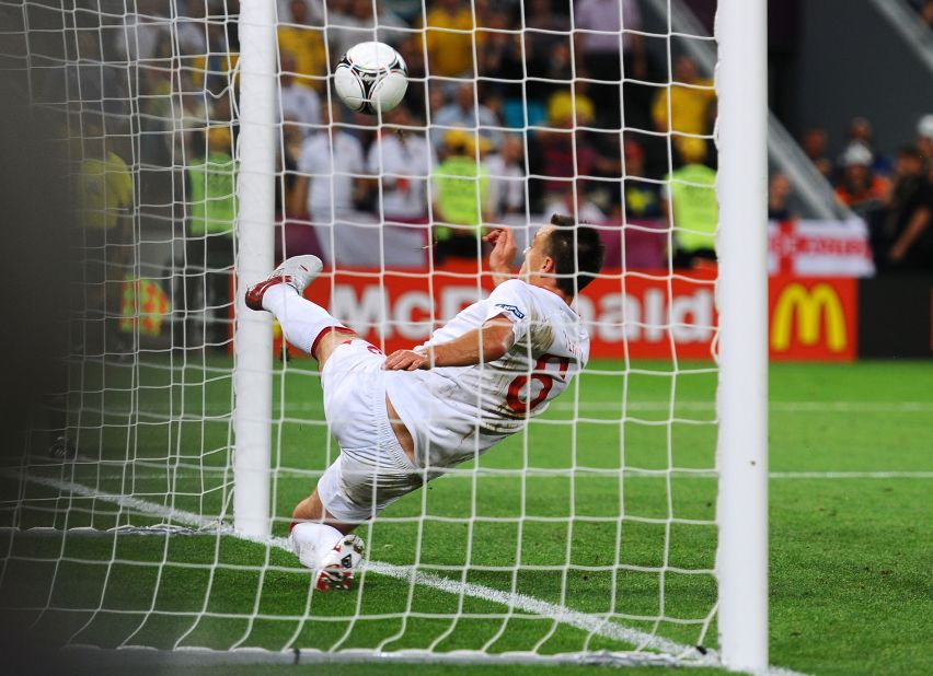 At the Euro 2012 tournament, England were involved in controversy for a third time. Co-hosts Ukraine needed to beat England to advance from the group stage, but fell behind to a Wayne Rooney header.  Artim Milevskiy thought his shot had crossed the line before John Terry was able to hook it clear, but once again no goal was given and Ukraine crashed out.