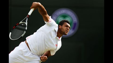 Tsonga of France serves against Kohlschreiber of Germany in this quarter final match.