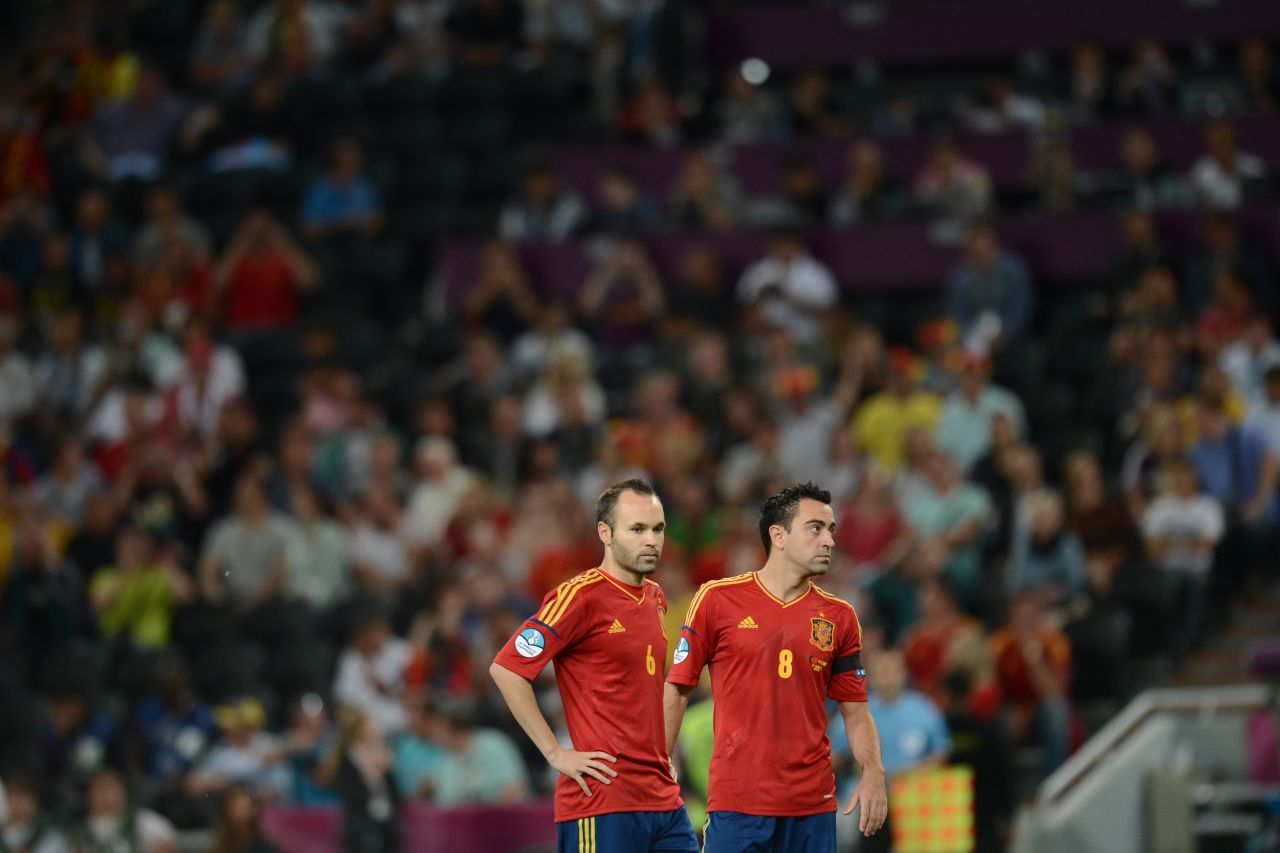 Spain's midfield pairing of Andres Iniesta (left) and Xavi (right) have epitomised the team's passing-based style. The Barcelona pair have been much-heralded throughout Spain's recent triumphs, with Iniesta being named the best player at Euro 2012.