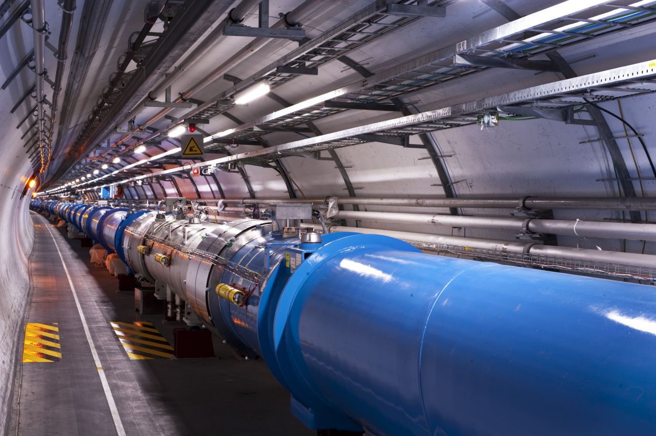Higgs boson research takes place at the Large Hadron Collider -- a circular tunnel located 100 meters (328 feet) underground. It uses a particle accelerator to collide protons at extreme speeds. By combining their data, researchers found that there are different ways to produce a Higgs boson, and different ways for a Higgs boson to decay to other particles.