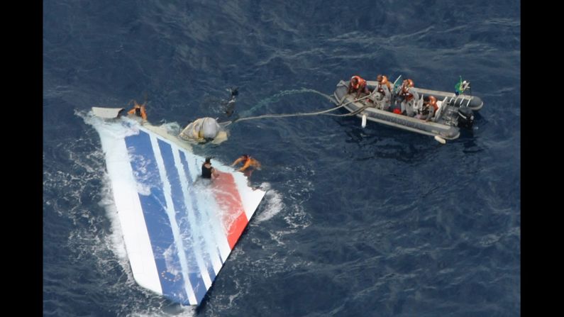 On June 1, 2009, Air France Flight 447 plunged into the Atlantic Ocean en route to France from Brazil, killing all 228 passengers on board. Six days later, on June 7, Brazilian Air Force crew members prepare to tow part of the wreckage from the Atlantic Ocean.