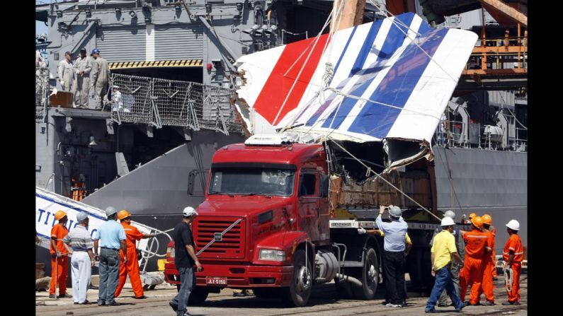 The recovered tailfin of  Air France's Airbus A330 is unloaded at the Port of Recife, Brazil, on June 14, 2009. The aircraft's voice recorder and flight data recorder were found on the ocean floor in May 2011 after an extensive search using miniature submersible vehicles.