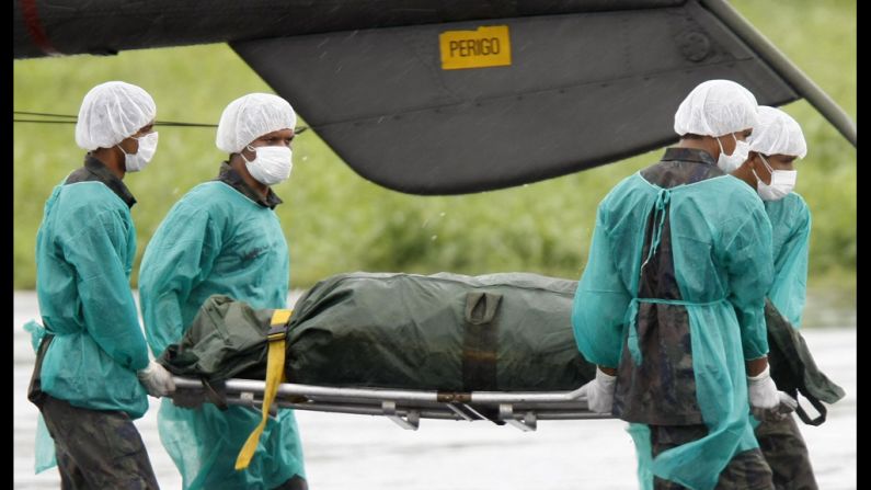 Brazilian Air Force personnel unload the remains of a passenger on June 9, 2009. France's Bureau of Investigation and Analysis said the data indicated that Flight 447 crashed because the aircraft's speed sensors gave invalid readings.