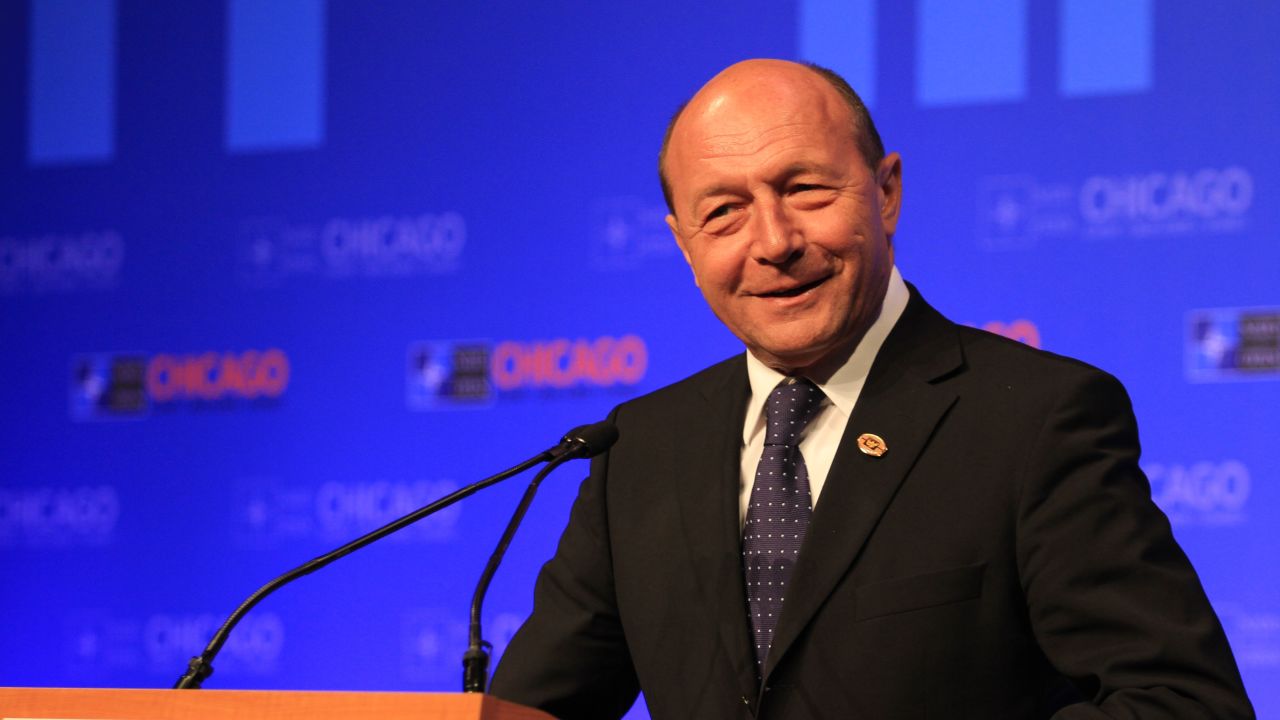 Romania's ruling coalition accused President Traian Basescu of violating the country's constitution.