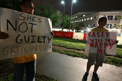 <strong>July 2011: </strong>Others, such as Tim Allen, right, and David Antolic, held signs of a different tone in front of a jail in Orlando on July 16, 2011, the day before Anthony was released.