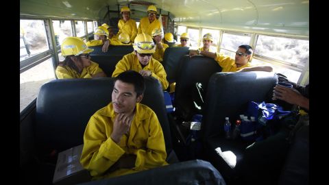 Firefighter Ryan Christian sits with his crew from Alaska before heading out to fight the Fontenelle Fire outside Big Piney. The blaze, burning in dead and thick stands of timber, started on June 24 and is 15% contained.