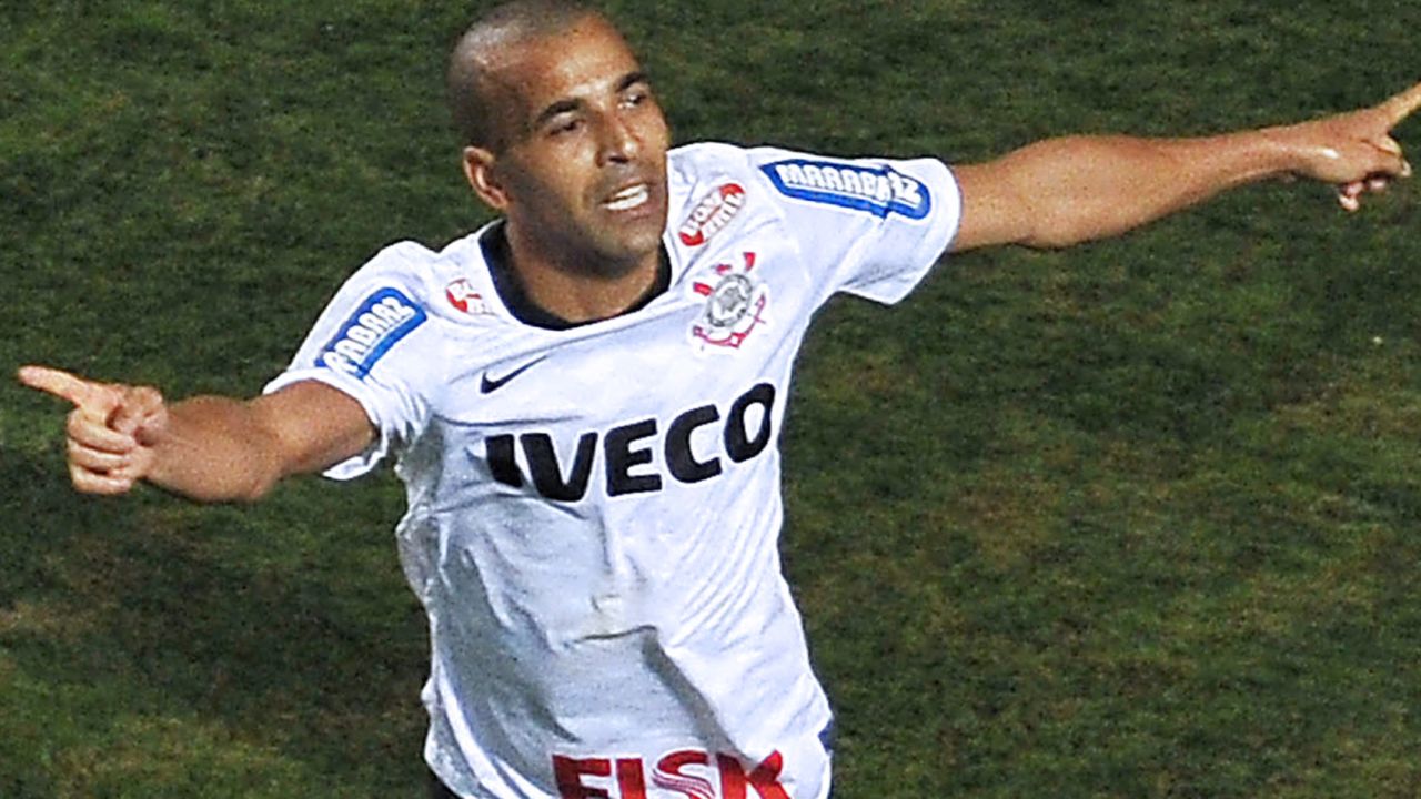 Brazilian striker Emerson scored twice as Corinthians claimed the Copa Libertadores for the first time. 