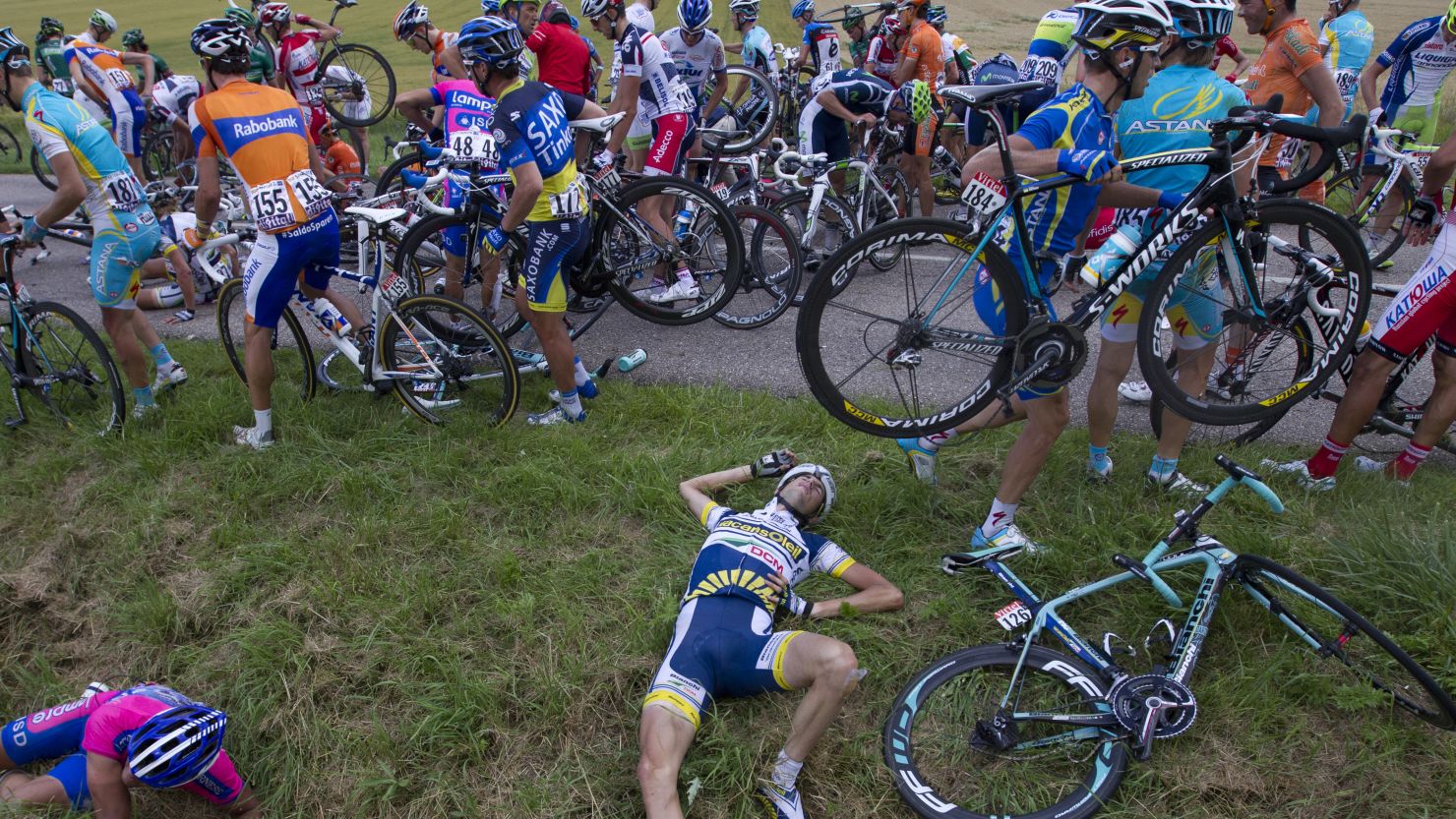 Pain game: Dutchman Wouter Poels falls victim to the mass pile-up on the sixth stage of the Tour de France.