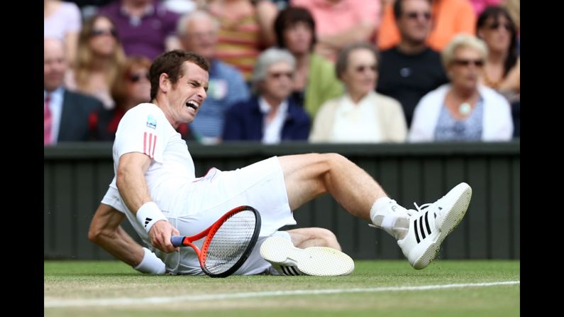 Murray grimaces as he slips to the ground. See the action as it unfolds here, and visit <a href="index.php?page=&url=https%3A%2F%2Fwww.cnn.com%2F2012%2F07%2F06%2Ftennis%2Fgallery%2Fuk-murray%2FCNN.com%2Ftennis">CNN.com/tennis</a> for complete coverage.
