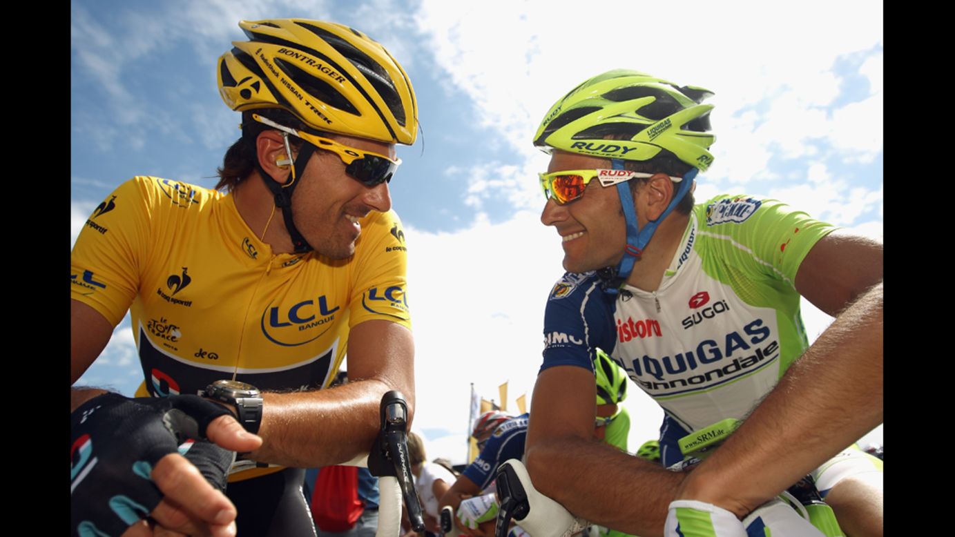 Race leader Fabian Cancellara chats to Ivan Basso of Italy at Stage 5, from Rouen to Saint-Quentin, on Thursday, July 5.