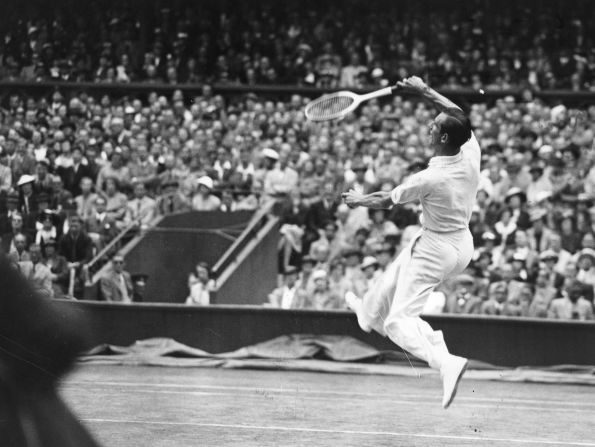 Fred Perry jumps for the ball against Germany's Gottfried von Cramm during the men's singles final on July 3, 1936. Perry defeated von Cramm that year to win his third straight title. But since then no male from the UK has won his country's most coveted title, and none had even made it to the final since Henry Wilfred "Bunny" Austin in 1938. Thus, the eyes of the nation will be upon Andy Murray on Sunday in the 2012 championship match against six-time champion Roger Federer of Switzerland.