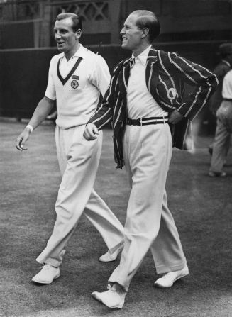 Perry, left, and von Cramm walk together before competing against each other for the championship.
