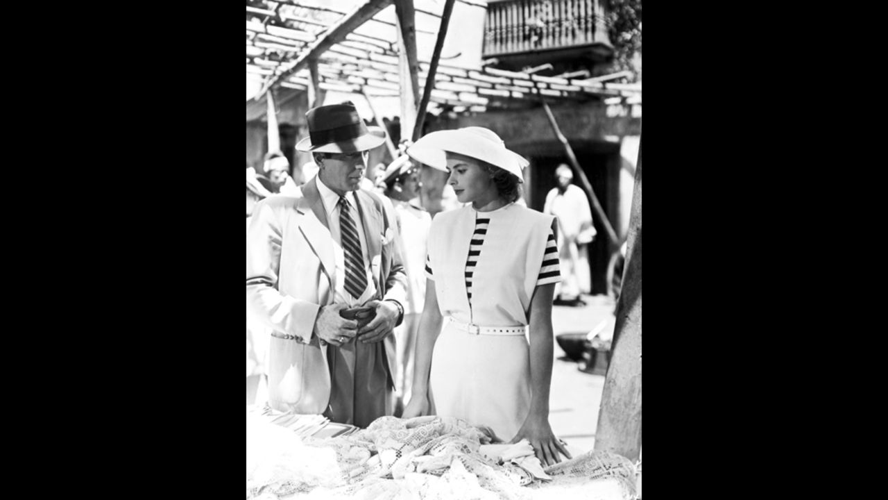 Rick and Ilsa talk in a bazaar after her surprising arrival in Casablanca. She is the wife of Victor Laszlo (played by Paul Henreid), a Czech resistance leader whom she had thought to be dead when she fell in love with Rick in Paris.
