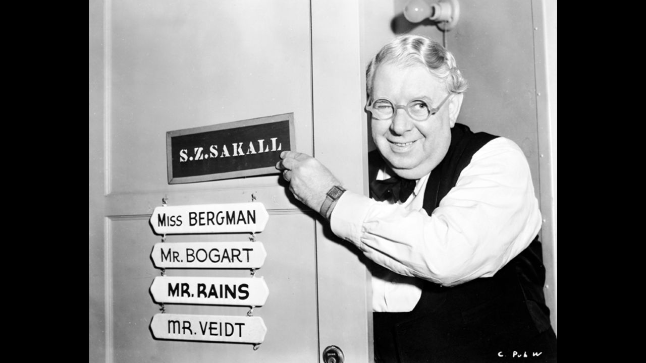 The actor S.Z. Sakall, who played Carl, poses on set outside his dressing room. Carl is a waiter at Rick's Cafe, where Bogart's character, Rick, has made a point of hiring European refugees, Mills notes.