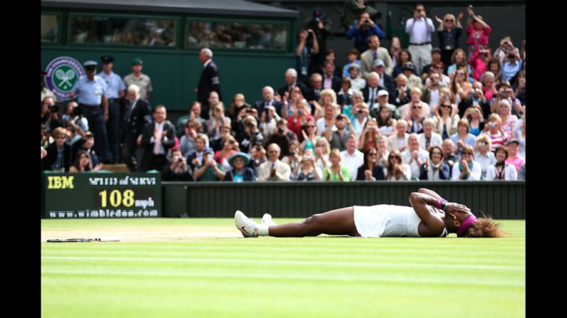 Serena Williams celebrates her win against Poland's Agnieszka Radwanska for her fifth Wimbledon title. Visit <a href="index.php?page=&url=http%3A%2F%2Fedition.cnn.com%2FSPORT%2Ftennis%2F">CNN.com/tennis</a> for complete coverage.