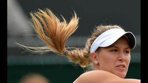 Canada's Eugenie Bouchard hits the ball in the girls' singles final against Ukraine's Elina Svitolina on Saturday.