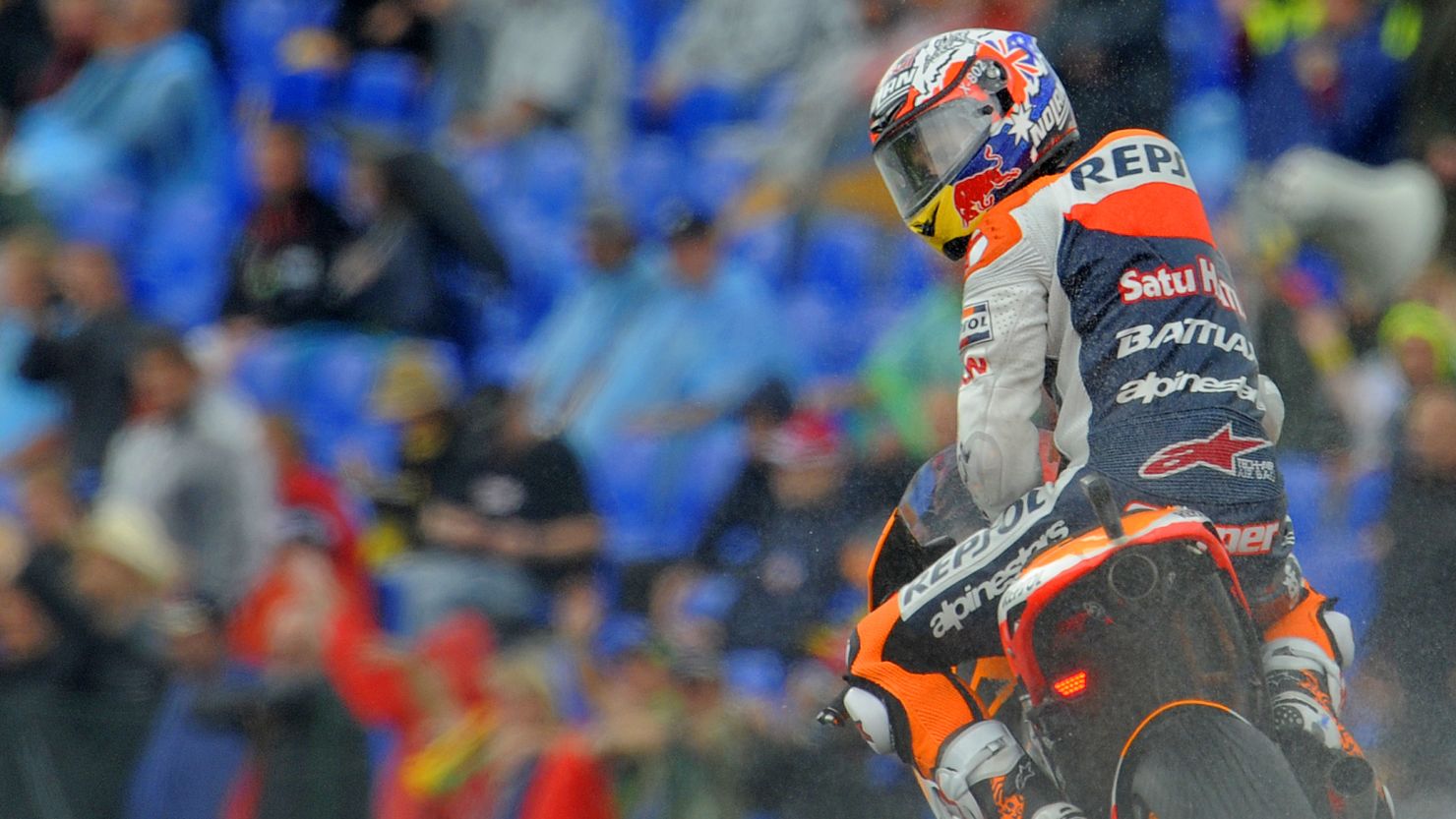 Casey Stoner looks back after setting the fastest lap in qualifying for the German MotoGP.