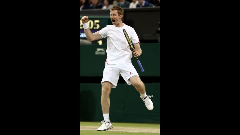 Britain's Jonathan Marray celebrates a point during the men's doubles final match at Wimbledon on Saturday, July 7. Marray was teamed with Denmark's Frederik Nielsen against Romania's Horia Tecau and Sweden's Robert Lindstedt.