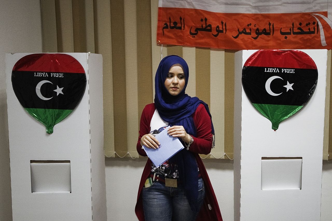 A woman prepares to cast her ballot at a Tripoli polling station.