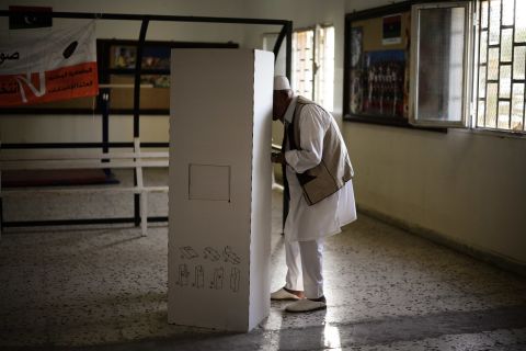 A man casts his vote at a Tripoli voting station on Saturday during Libya's General National Assembly election.