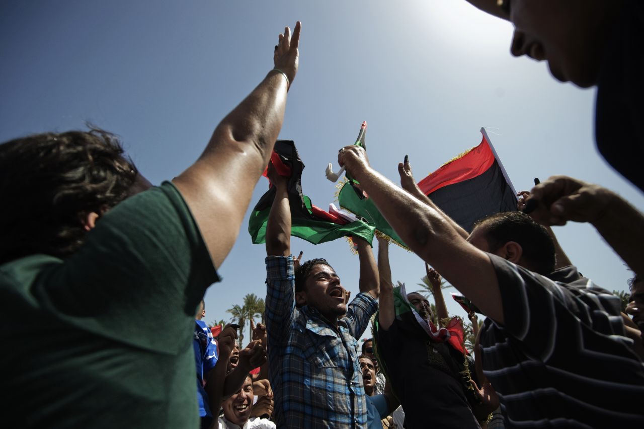 Libyans celebrate in Tripoli's Martyrs' Square after voting for the Libyan General National Assembly.