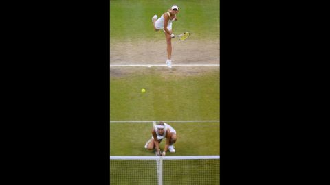 Czech Republic's Lucie Hradecka crouches as Andrea Hlavackova serves during their women's doubles final match against Venus and Serena Williams. 