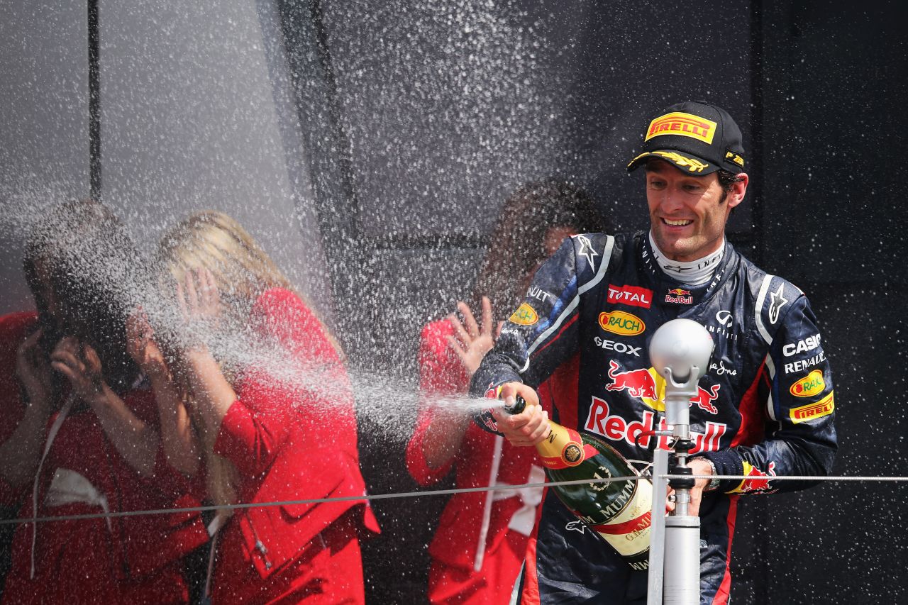 Red Bull's Australian driver Mark Webber celebrates after winning the British Grand Prix at Silverstone -- his second victory of the 2012 season. The Australian held off Ferrari's Fernando Alonso in a close battle to win the race.