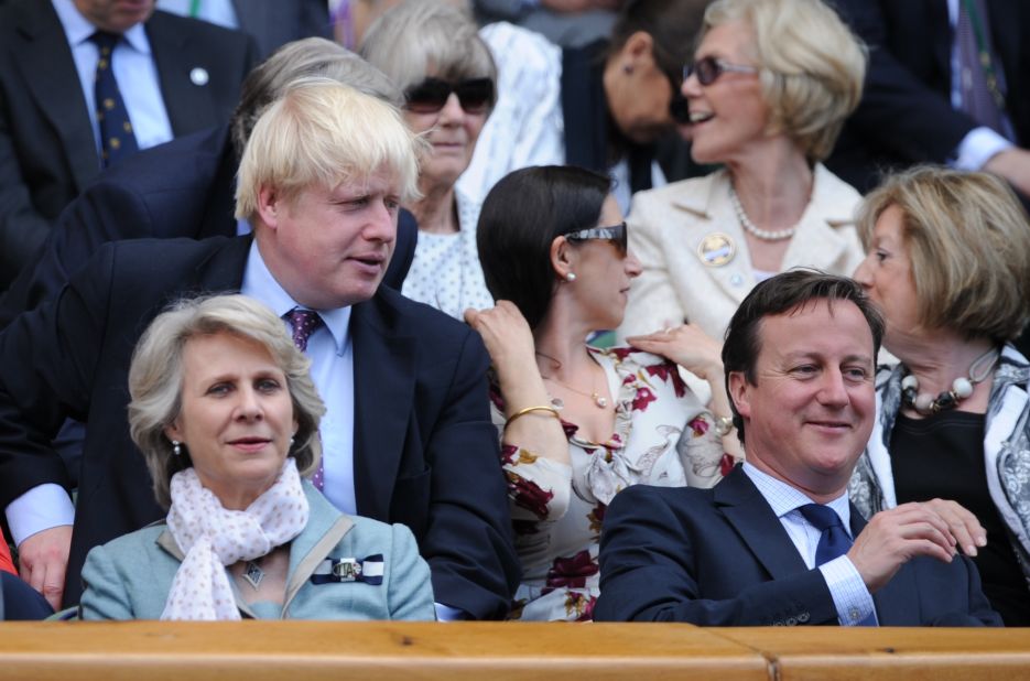 London's Mayor Boris Johnson, top left, and Britain's Prime Minister David Cameron, right, attend the match Sunday.