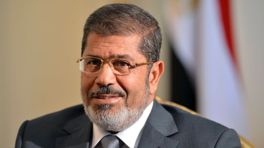 Egyptian President Mohamed Morsi looks on as he meets with US deputy secretary of State William Burns (not seen) in Cairo on July 8, 2012. 