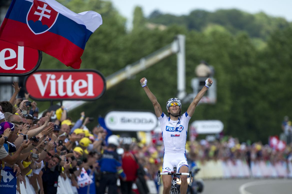 Thibaut Pinot of France celebrates on the finish line after winning Stage 8 of the Tour de France on Sunday, July 8. The stage covered 157.5 kilometers (98 miles) from Belfort, France, to Porrentruy, Switzerland, with seven major climbs.