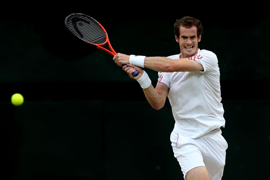 Murray, the first Briton to reach a men's singles final at Wimbledon in 74 years, returns a shot to Federer during the match Sunday.