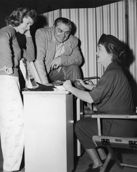 Debbie Reynolds, left, and Borgnine chat with Bette Davis on the set of the 1956 Richard Brooks' film "'The Catered Affair."