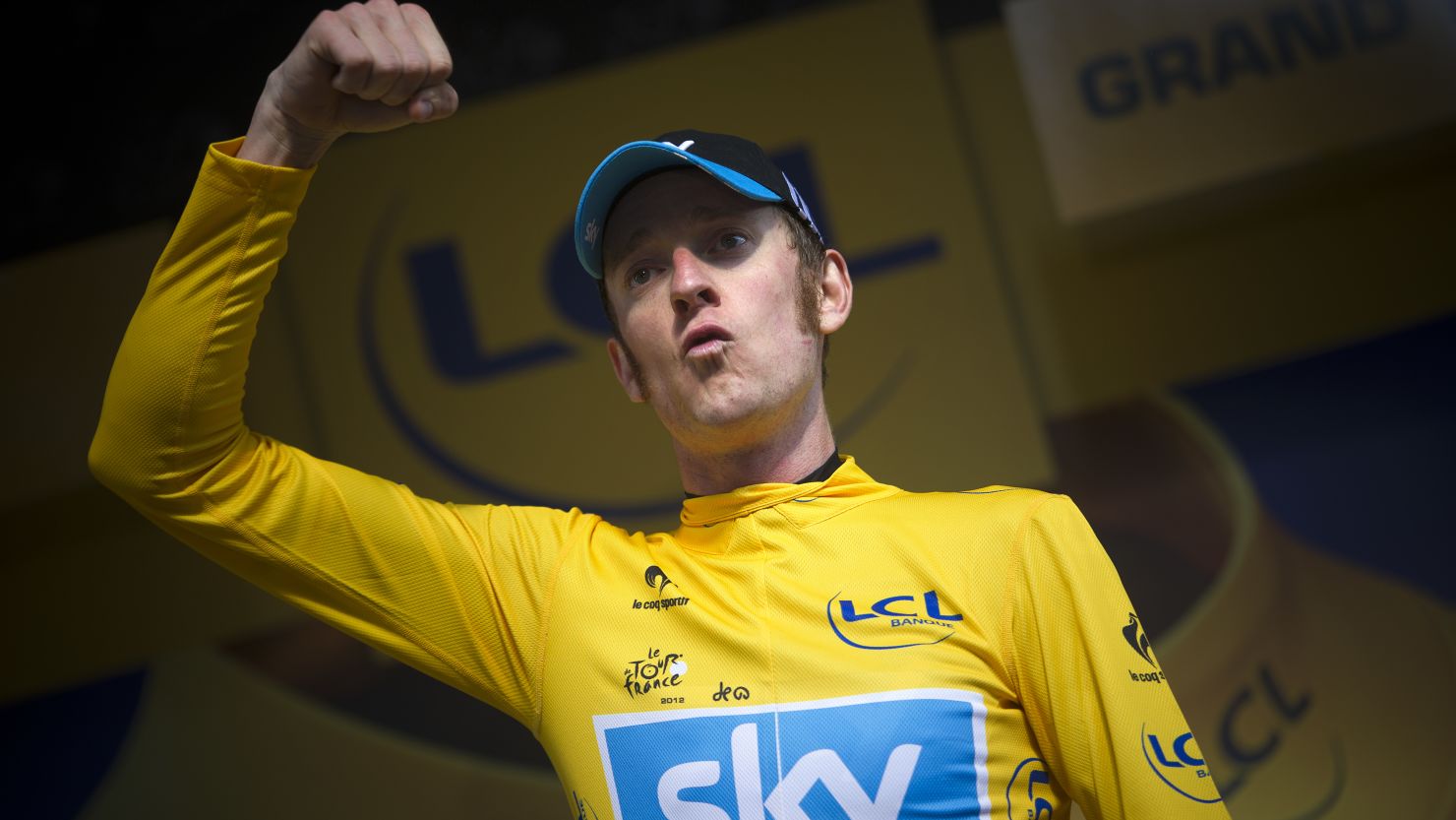Bradley Wiggins celebrates after a dominant performance saw him take control of the Tour de France