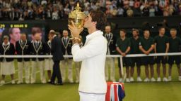 Roger Federer celebrates a record-equaling seventh Wimbledon triumph, a 17th grand slam title and a return to the top of the world rankings. 