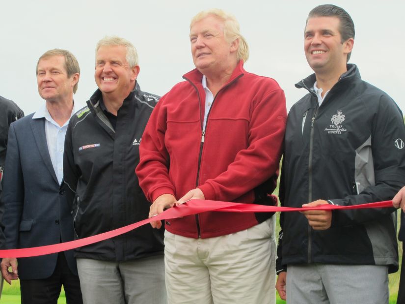 Trump (second from the right) cuts the ribbon at the grand opening of the Trump International Golf Links.