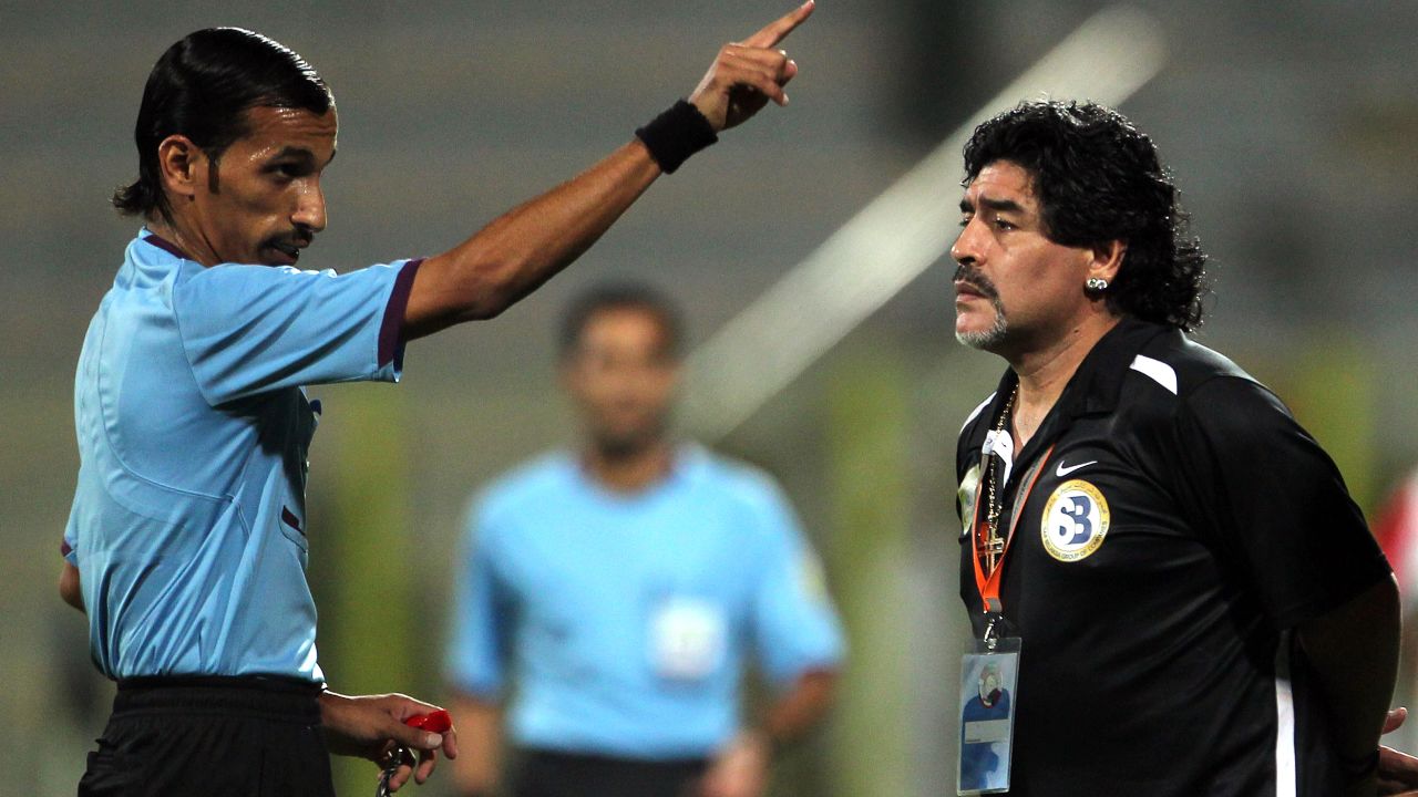 Diego Maradona is warned by a referee during Al-Wasl's defeat in the final of the GCC Champions League in June.