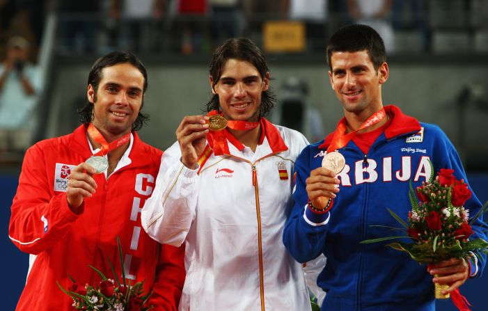 Fernando Gonzalez, left, poses with his silver medal at the 2008 Olympic Games after being beaten by Rafael Nadal, center, in the final. Novak Djokovic, right, took the bronze.
