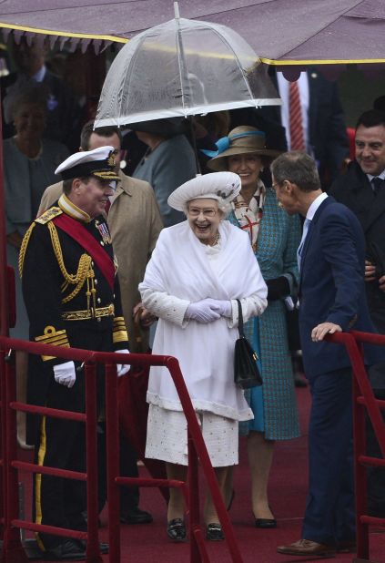 The Queen's Jubilee celebrations were dominated by rain as Her Majesty and the Royal Family were forced to brave wet and chilly conditions during a flotilla on the River Thames.