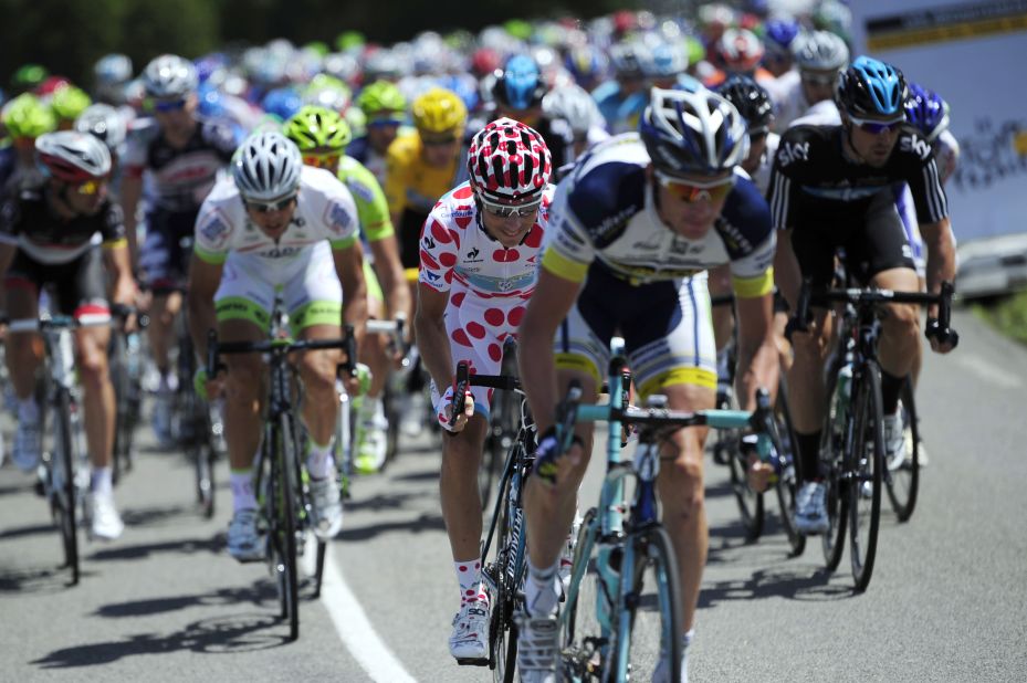 Frederik Kessiakoff of Sweden, wearing the polka dot jersey signifying his position as the best climber in the race, races among the peloton Wednesday.