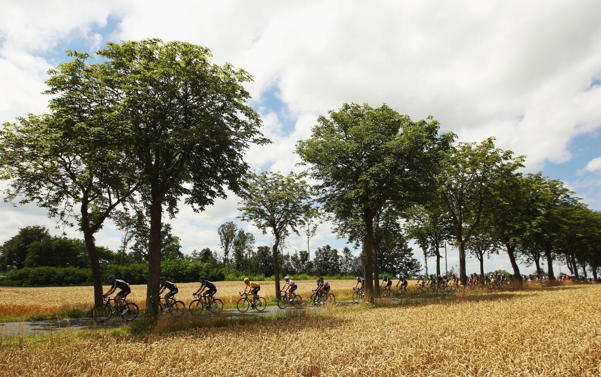 Race leader Bradley Wiggins of Great Britain rides through the French countryside in the main pack of riders Wednesday.