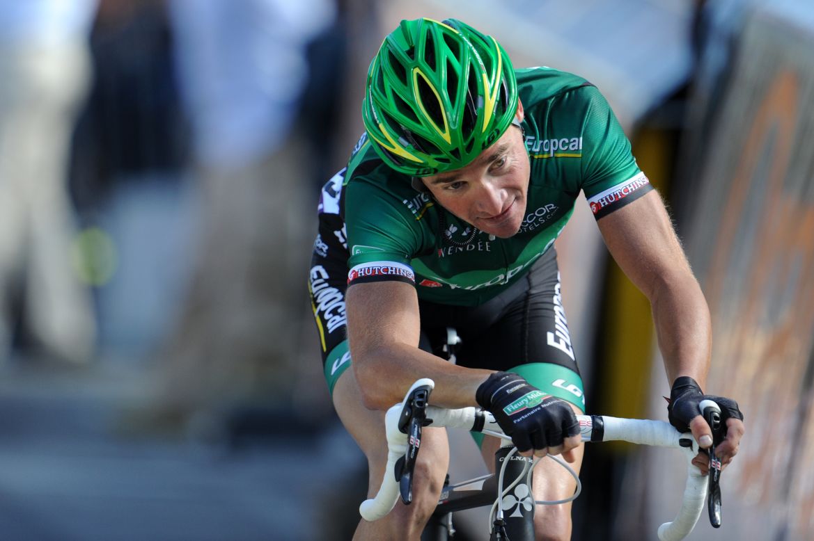 Voeckler crosses the finish line first at the mountaintop finish at Bellegarde-sur-Valserine on Wednesday.