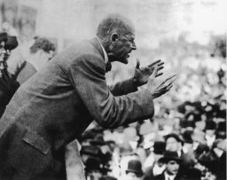 Eugene Debs addresses a crowd of people, circa 1910. (Photo by Fotosearch/Getty Images). 