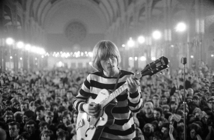 Brian Jones performs at  Alexandra Palace, London, in 1964. One of the founding members of the band, Jones was found dead in his pool at Cotchford Farm, Sussex, on July 2, 1969. He was 27.