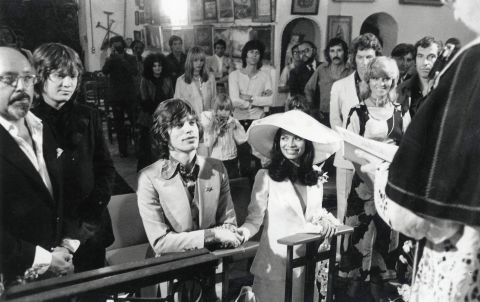 Mick Jagger and Nicaraguan girlfriend Bianca Perez Moreno De Macias marry in a small fisherman's church in St. Tropez, France, in 1971. Among the guests pictured are film director Roger Vadim, actress Nathalie Delon, photographer Patrick Lichfield, Keith Richards and Anita Pallenberg.
