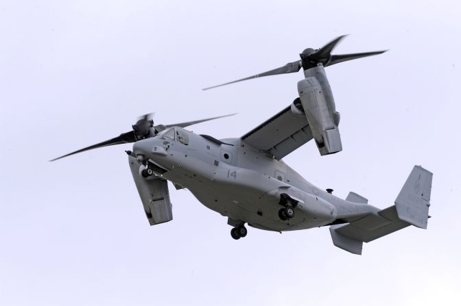 A U.S. Marines Bell Boeing MV-22 Osprey tiltrotor flies across the sky at Farnborough 2012.