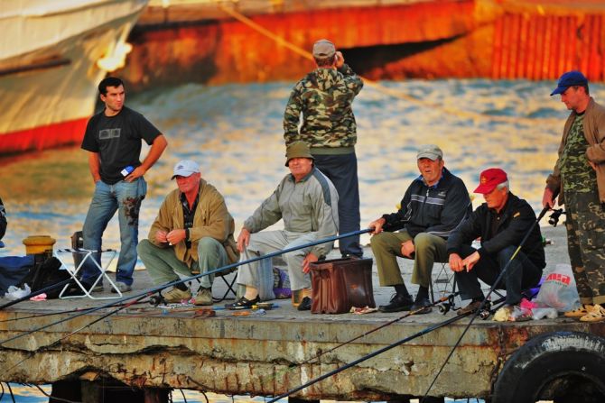 This image of a group of men fishing on a crumbling pier was captured by Craig Smith in the southern harbor city of Odessa. "I wanted to capture .... the coastline as well as the friendly people who we met on the streets," he says.