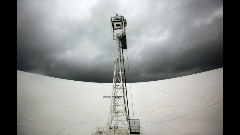 Comedian John Bishop carries the Olympic flame on top of the Jodrell Bank Observatory in Jodrell Bank, England, on May 31.