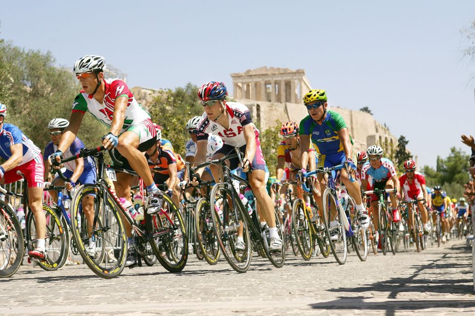 Sometimes, it isn't important to showcase where an event is taking place. But because of great scouting and positioning, Bob Martin was in the right spot to capture this long, elegant, powerful line of cyclists against the backdrop of the Parthenon in Athens. The shot is well-exposed on a sunny day, making those team colors really pop. The contrast is engaging -- putting an ancient landmark against the sea of bright-colored jerseys. But it also shows where the Olympics have been, and where they're going. 