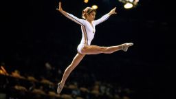 Famed sports photographer Neil Leifer dreamed of getting this shot of 1976 Olympic star Nadia Comaneci. Because of his determination, planning and excellent position in the gym, he did. The photo exemplifies the 14-year-old's performance at the 1976 games -- she was the first gymnast in Olympic history to be awarded the perfect score of 10. Perpendicular to the balance beam, Leifer cut out any other distractions and focused on Comaneci during a peak moment. She's practically dancing on air, performing against the dark curtain of the audience. It captures her grace beautifully and simply, and freezes her victory in time.
